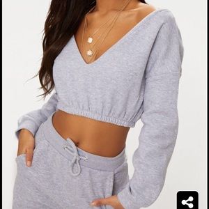 Crop off shoulder sweater